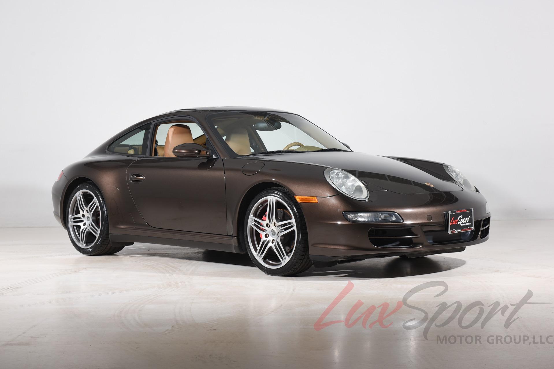 Porsche 911 997 Carrera Coupé 2008 1:18 Norev - eBay